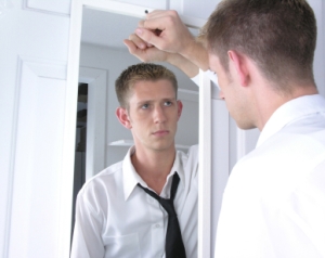 man-looking-into-mirror[1]